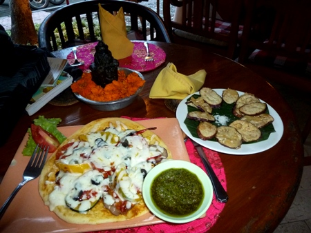 Pesto pizza and eggplant chips at Bumbu Bali, Ubud, Bali. Pesto pizza and eggplant chips at Bumbu Bali, Ubud, Bali.