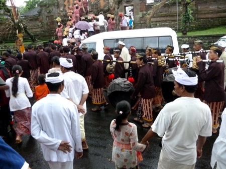 Ascending the steps into the temple at Pura Marajan Agung, Ubud, Bali.