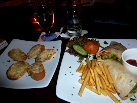 Veggie wrap, fries and garlic bread at Shiva Lounge, Ubud, Bali. Veggie wrap, fries and garlic bread at Shiva Lounge, Ubud, Bali.