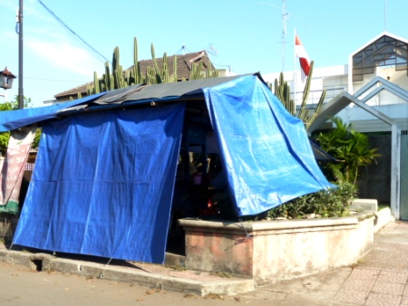 A typical plastic covered food stall in Solo Java. Usually set up in slums, these things look really gloomy at night. A typical plastic covered food stall in Solo Java. Usually set up in slums, these things look really gloomy at night.