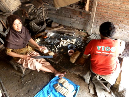 Women at work in a small rice cracker factory in Solo, Java. Women at work in a small rice cracker factory in Solo, Java.
