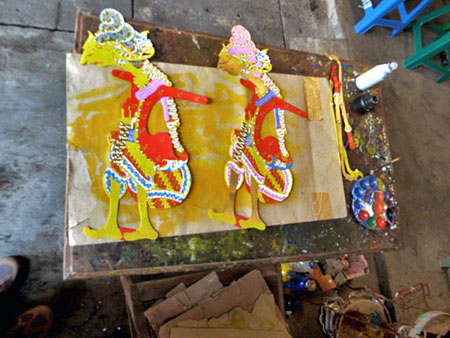Two Wayang Kulit puppets partially completed at a shop near the Sultan's Palace in Yogyakarta, Java.