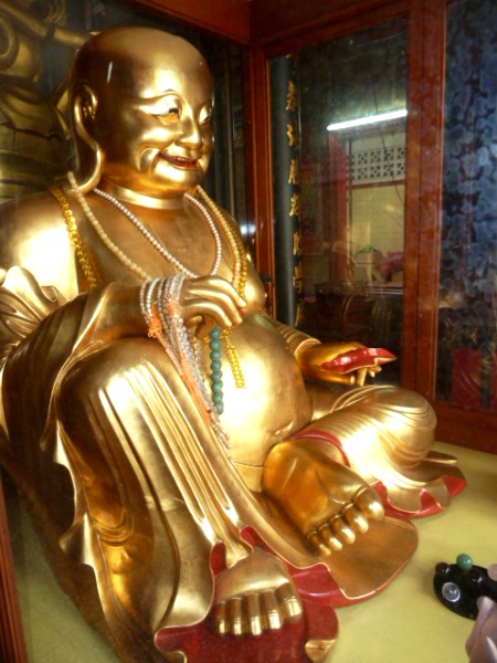 A golden Buddha at the Sakaya Muni Buddha Gaya Temple in Little India, Singapore. A golden Buddha at the Sakaya Muni Buddha Gaya Temple in Little India, Singapore.