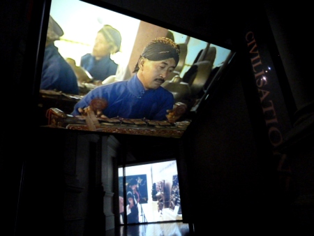 Two of three video projections at the Asian Civilizations Museum in City Centre, Singapore.