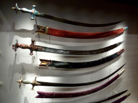 A set of bejeweled Indian Mughal swords at the Asian Civilizations Museum in City Centre, Singapore.