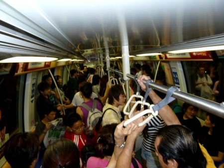A busy night on the subway in Singapore.