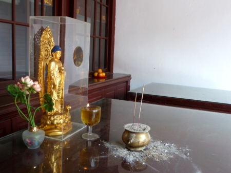 An offering for Buddha at the Thian Hock Keng Temple in Chinatown, Singapore. An offering for Buddha at the Thian Hock Keng Temple in Chinatown, Singapore.