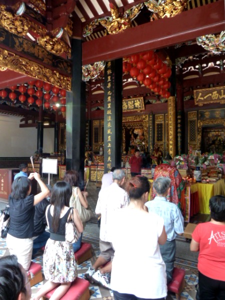 A prayer service at the Thian Hock Keng Temple in Chinatown, Singapore. A prayer service at the Thian Hock Keng Temple in Chinatown, Singapore.