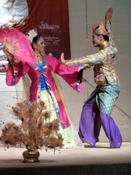 A traditional Malaysian dance at the Central Market in Chinatown, Kuala Lumpur, Malaysia. A traditional Malaysian dance at the Central Market in Chinatown, Kuala Lumpur, Malaysia.