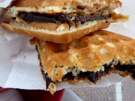 A yummy chocolate-covered waffle at the Central Market in Chinatown, Kuala Lumpur, Malaysia. A yummy chocolate-covered waffle at the Central Market in Chinatown, Kuala Lumpur, Malaysia.