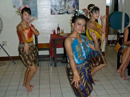 A little traditional Thai dance at May Kaidee's in Banglamphu, Bangkok, Thailand.