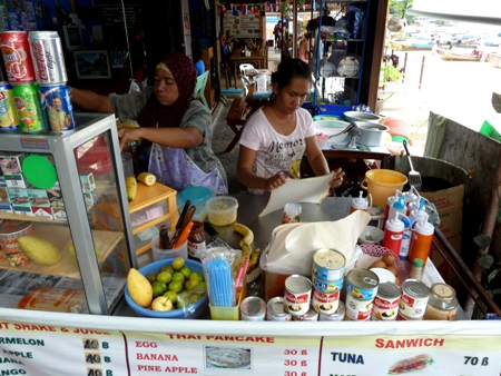That greasy pancake ended up all over the front of my shirt. Ao Ton Sai Bay food stall at Ko Phi Phi Don, Thailand.