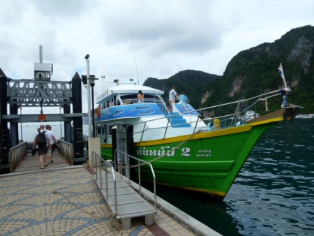 Boarding the boat for a snorkeling tour of the Phi Phi islands, Thailand. Boarding the boat for a snorkeling tour of the Phi Phi islands, Thailand.