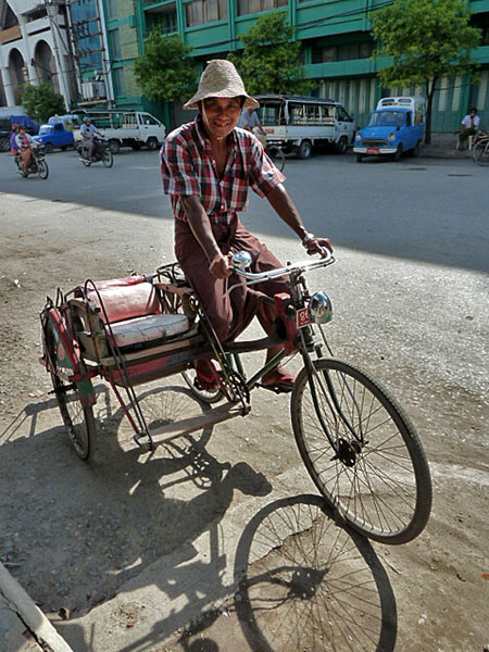 This trishaw driver gave me a lift through the dirty, stinking streets of Mandalay, Myanmar.
