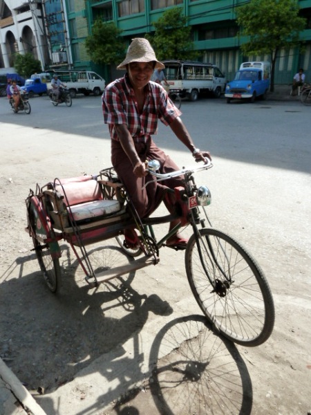 This trishaw driver gave me a lift through the dirty, stinking streets of Mandalay, Myanmar. This trishaw driver gave me a lift through the dirty, stinking streets of Mandalay, Myanmar.