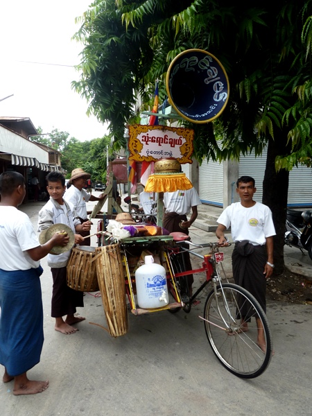 A street procession band called Thone Yaung Chael kicks up a ruckus in Mandalay, Myanmar.