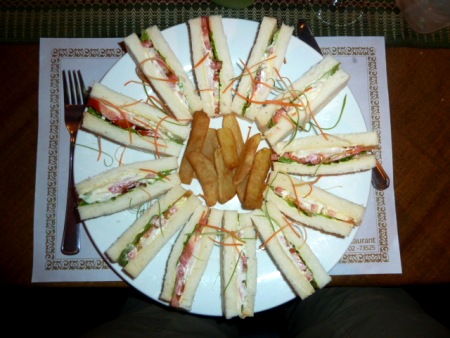 A veggie sandwich wheel and exactly eight French fries at BBB Cafe in Mandalay, Myanmar. A veggie sandwich wheel and exactly eight French fries at BBB Cafe in Mandalay, Myanmar.