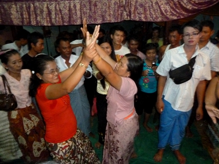 Nat worshippers engage in an ecstatic trance dance at the nat pwe in Taungbyone, Myanmar. Nat worshippers engage in an ecstatic trance dance at the nat pwe in Taungbyone, Myanmar.