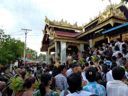 The main temple gets overwhelmed by a frenzy of the faithful at the nat pwe in Taungbyone, Myanmar. The main temple gets overwhelmed by a frenzy of the faithful at the nat pwe in Taungbyone, Myanmar.