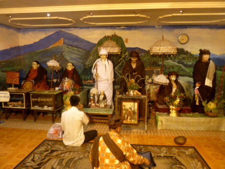 Some prayer activity goes down in one of the shrines at Botataung Pagoda in Yangon, Myanmar. Some prayer activity goes down in one of the shrines at Botataung Pagoda in Yangon, Myanmar.