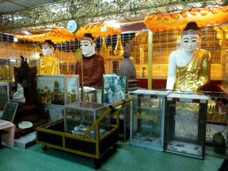 A triple-Buddha shrine at Botataung Pagoda in Yangon, Myanmar. A triple-Buddha shrine at Botataung Pagoda in Yangon, Myanmar.