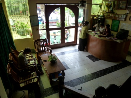The air-conditioned lobby of the Motherland II Inn in Yangon, Myanmar. Please install some cushions on those chairs. The air-conditioned lobby of the Motherland II Inn in Yangon, Myanmar. Please install some cushions on those chairs.