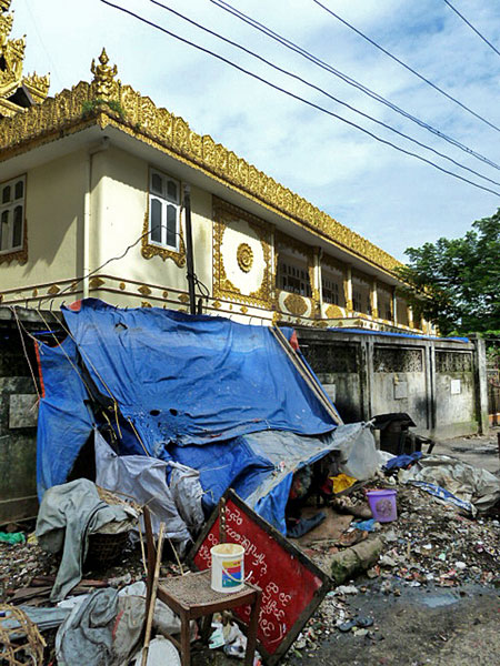 See that blue tarp? That's someone's house near Shwedagon Pagoda in Yangon, Myanmar.