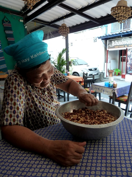 One of the cooks that makes the magic happen at May Kaidee's in Banglamphu, Bangkok, Thailand. One of the cooks that makes the magic happen at May Kaidee's in Banglamphu, Bangkok, Thailand.