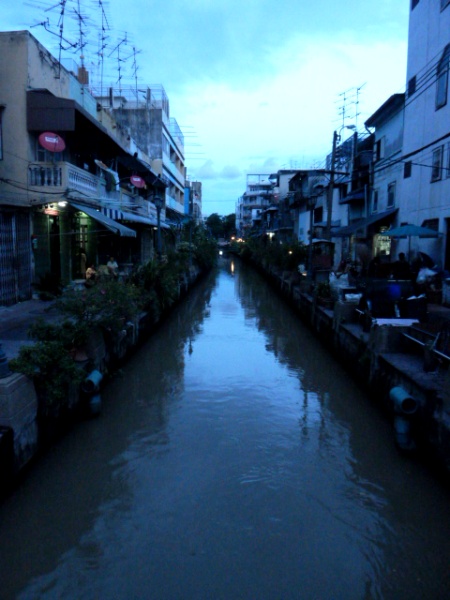 A canal at dusk in Bangkok, Thailand.