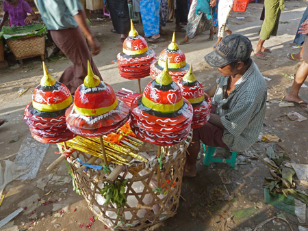 Hats for sale! A vendor at the Nat Pwe in Taungbyone, Myanmar.