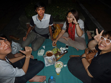 More Thais eat for fun on the sidewalk in Banglamphu, Bangkok, Thailand.