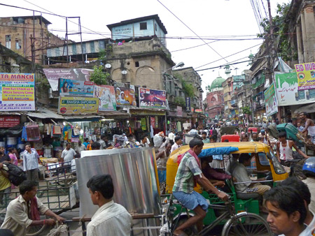 Crossroads confusion on Colootola Road in Kolkata, India.