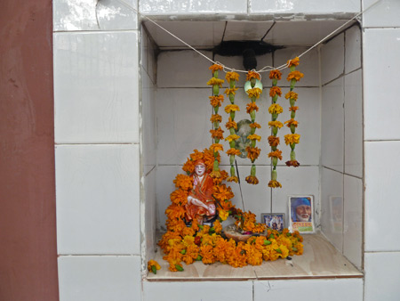A small Hindu shrine in the back lanes of Paharganj, Delhi, India.