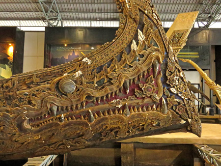 A close-up of a dragon on a barge at the National Museum of Royal Barges in Bangkok, Thailand.