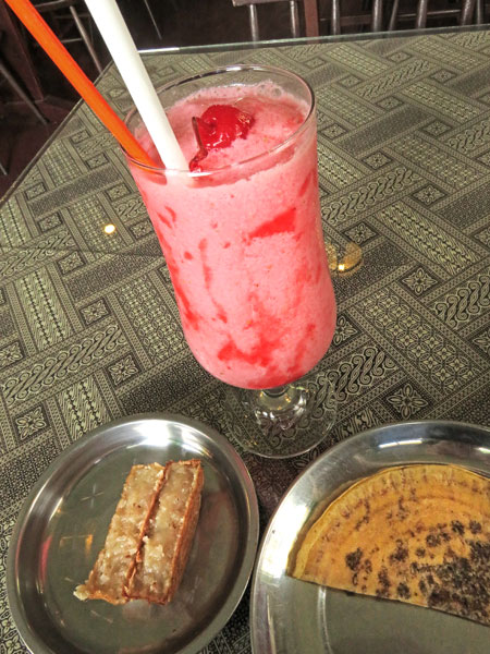 A strawberry shake and sweets at Roemah Indonesian Kitchen in Medan, Sumatra, Indonesia.