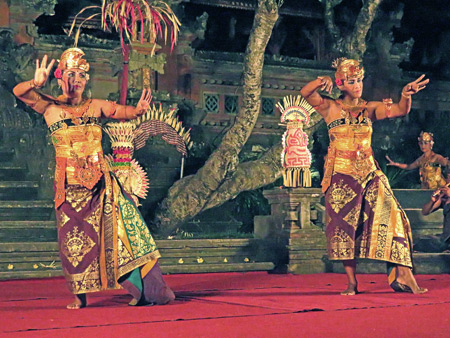 Janger Cahya Warsa performs the Janger dance at the Lotus Pond in Ubud, Bali, Indonesia.