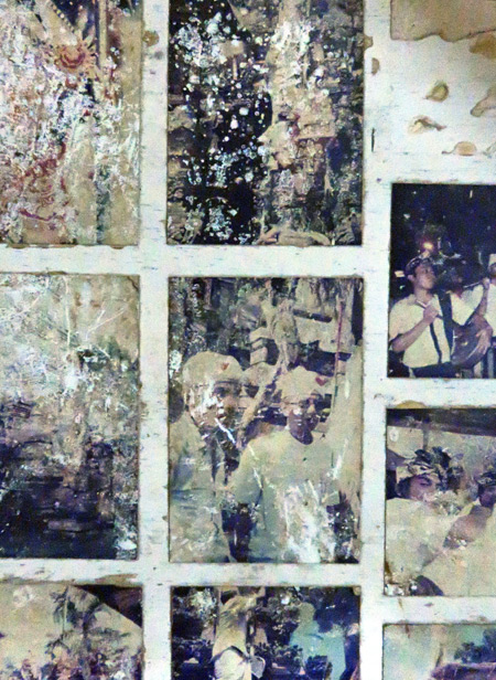Old, battered photos taped to the wall at Bale Banjar Ubud Kelod in Ubud, Bali, Indonesia.