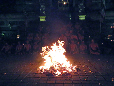 Desa Adat Sambahan prepares to perform the Fire Dance at Pura Batu Karu in Ubud, Bali, Indonesia.