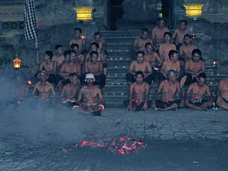 Desa Adat Sambahan relaxes after the Fire Dance at Pura Batu Karu in Ubud, Bali, Indonesia.