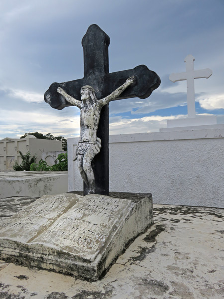 Jesus Christ and the Bible at the Cementerio de Granada, Nicaragua.