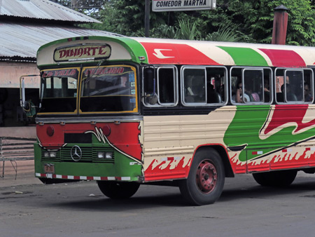 A colorful bus outside the Cementerio de Granada, Nicaragua.
