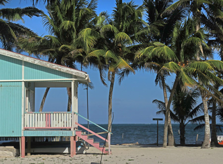A pastel-colored clapboard house in Caye Caulker, Belize.