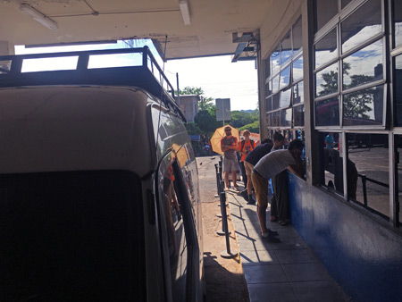 Entering El Salvador at the immigration office in El Amatillo.
