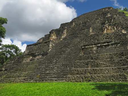 The front of the Lost World Pyramid in the Mundo Perdido complex at Tikal, Guatemala.