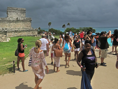 The tourist hordes converge upon the Tulum Ruins, Mexico.