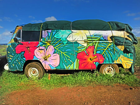 A flowery Volkswagen bus at Tongariki, Rapa Nui, Chile.