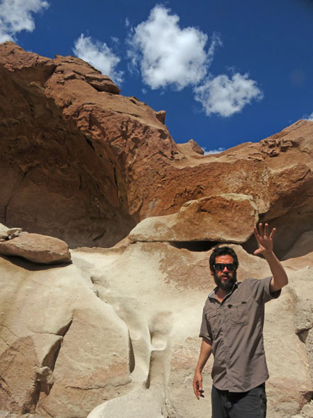 The Lithium Aventura tour guide Alan explains the history of the geology and rock carvings in the Valle de Arcoiris, near San Pedro de Atacama, Chile.