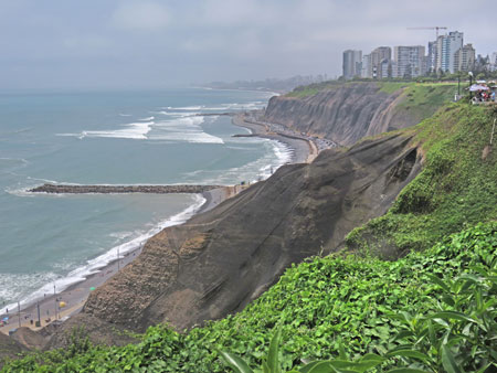 Looking northwest past a jetty in Miraflores, Lima, Peru.