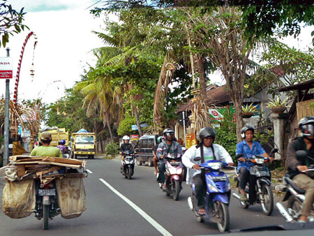 Standard motorcycle traffic in Bali.