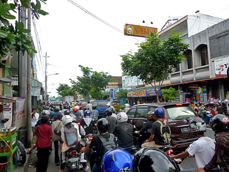 Your everyday, basic, insane motorcycle traffic in Yogyakarta, Java.